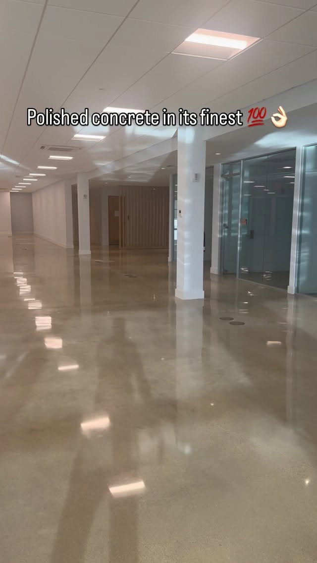 Bright office interior with a polished concrete floor shown in a reel cover